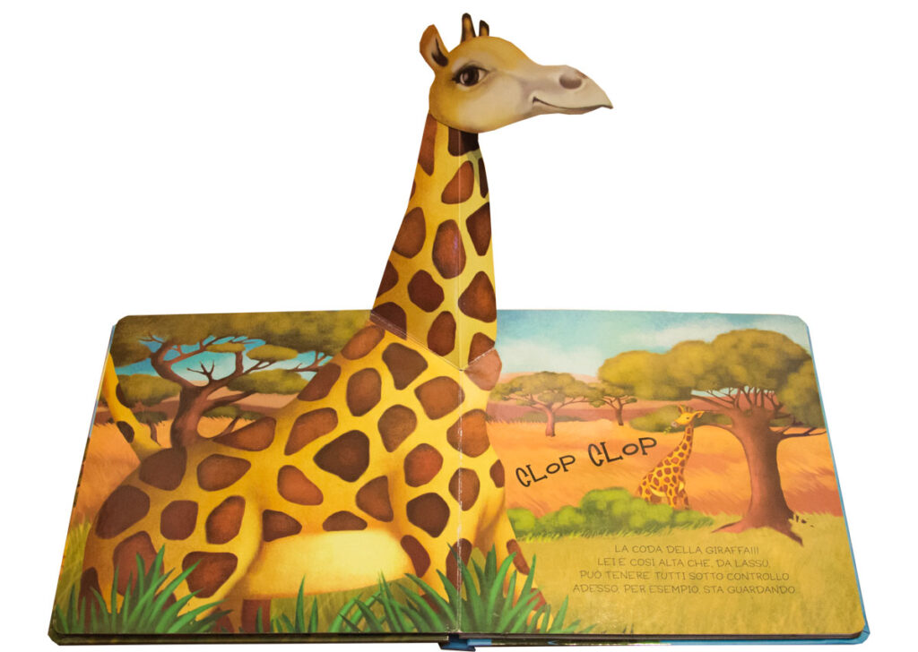 giraffa che emerge 3 D da un libro